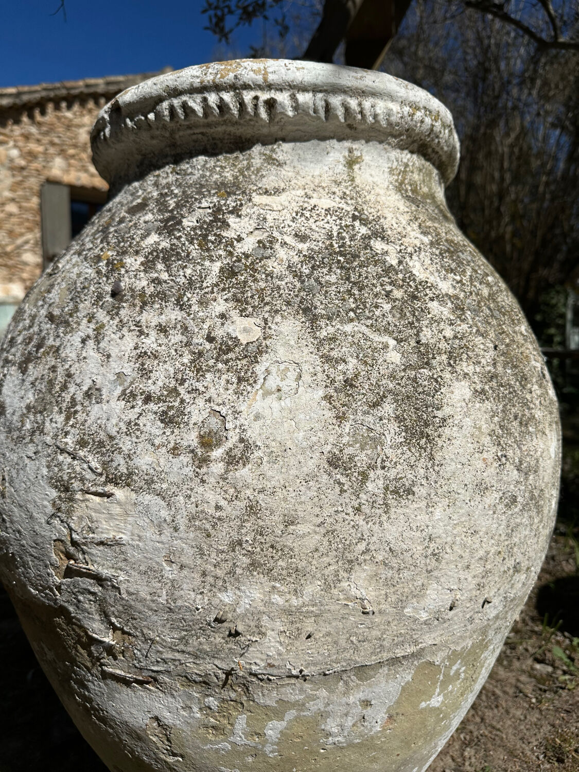Large ancient pottery jar in terracotta from the 18th century.