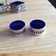 Salt shaker /pepper shaker and accessories in silver metal and blue glass compartment