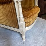 Mustard yellow velvet armchair