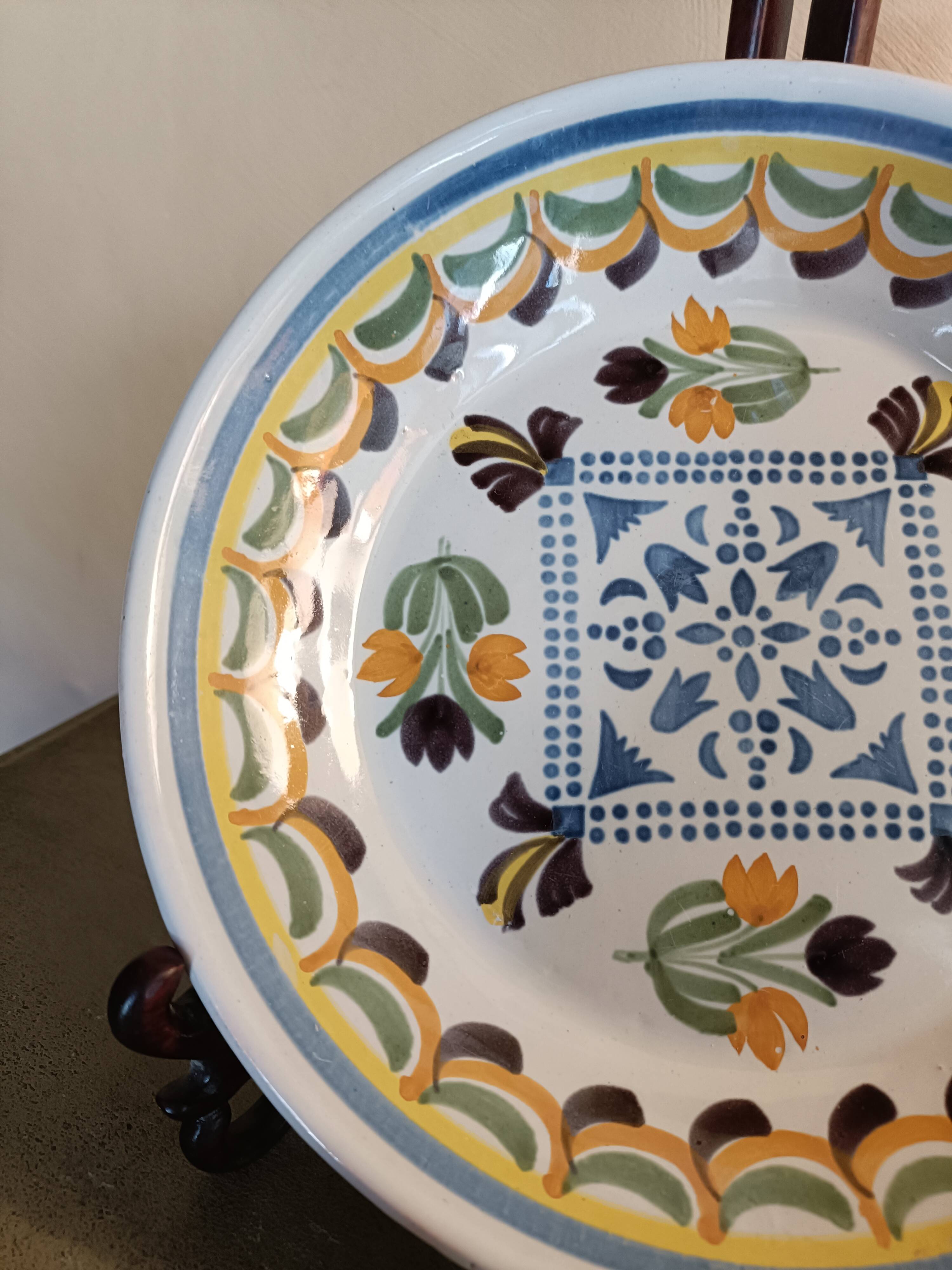 Antique calotte plate in Nevers faience.