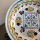 Antique calotte plate in Nevers faience.
