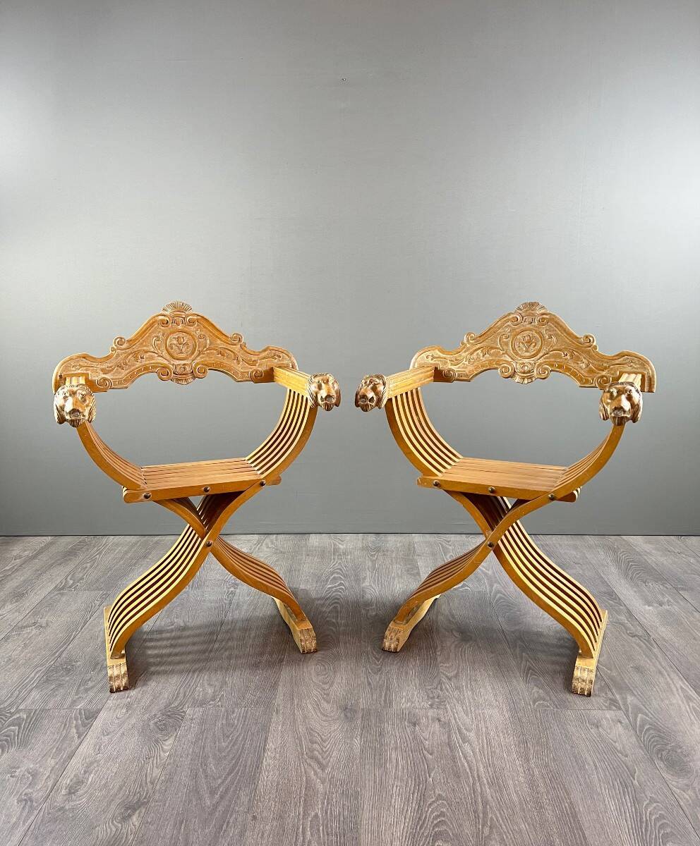 Pair of Renaissance-style folding armchairs, early 20th century
