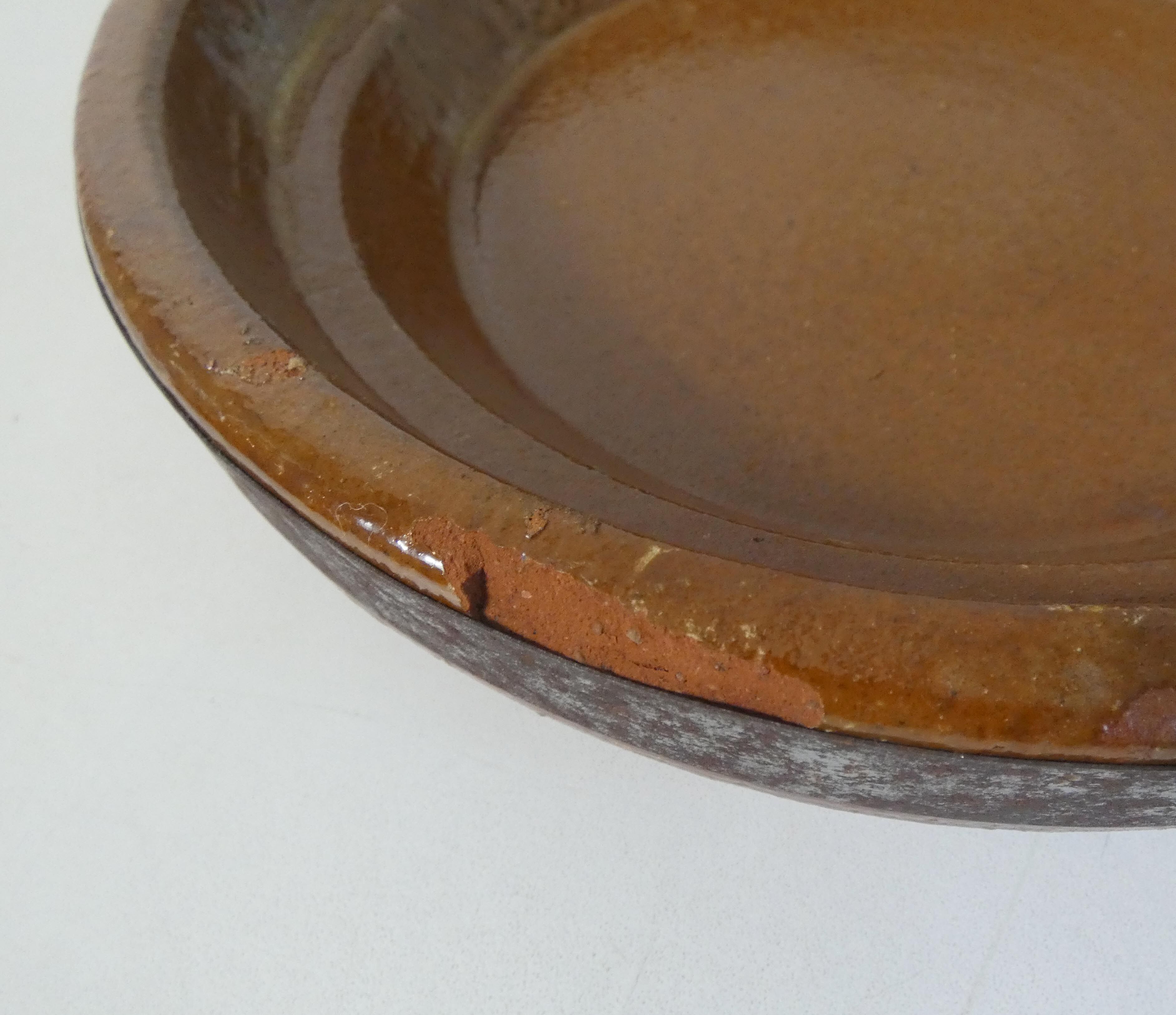 Old glazed terracotta tagine