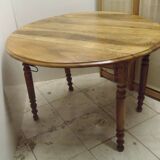 ﻿Round shutter table in solid walnut