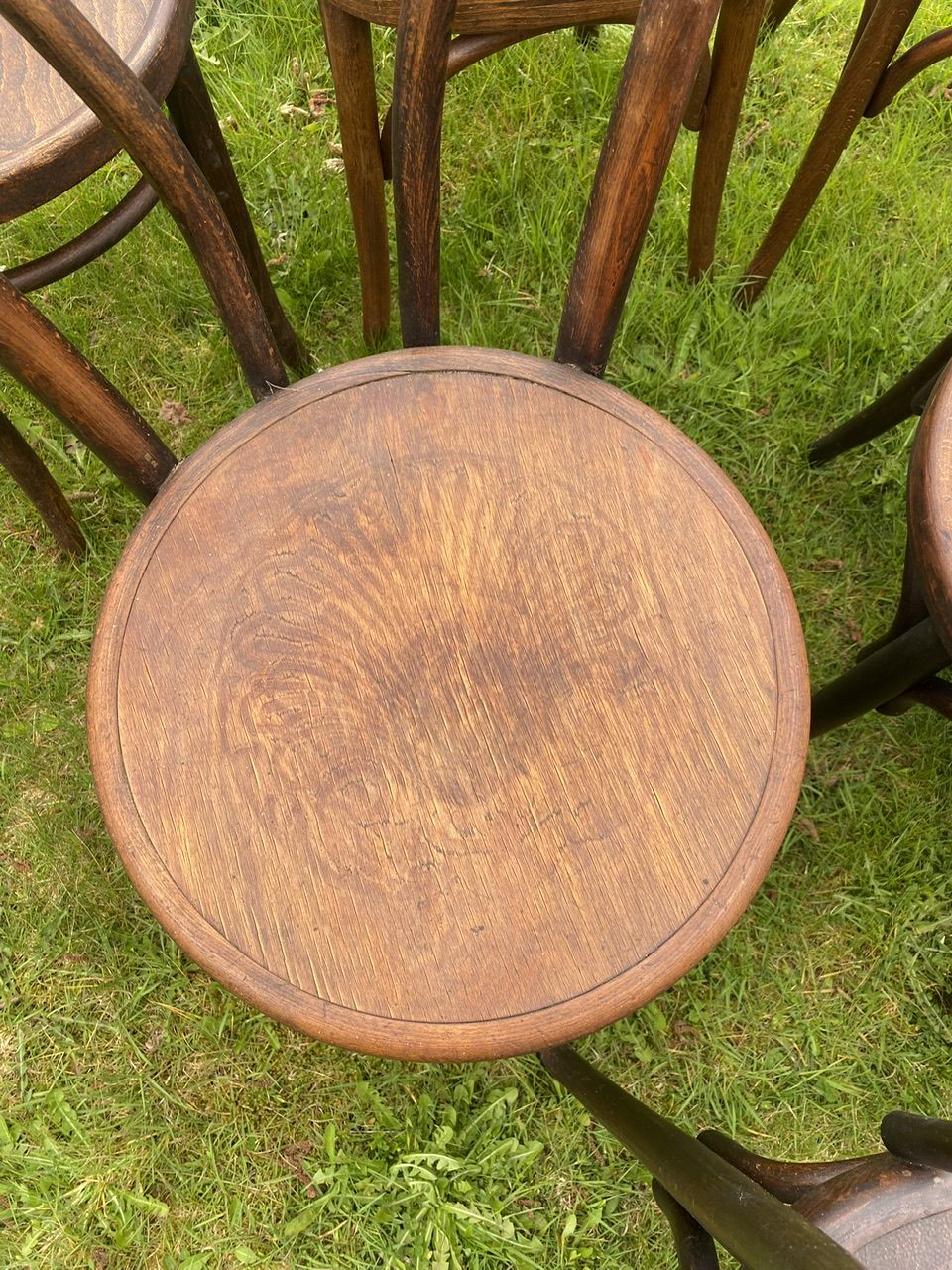Set of 8 mismatched bistro chairs