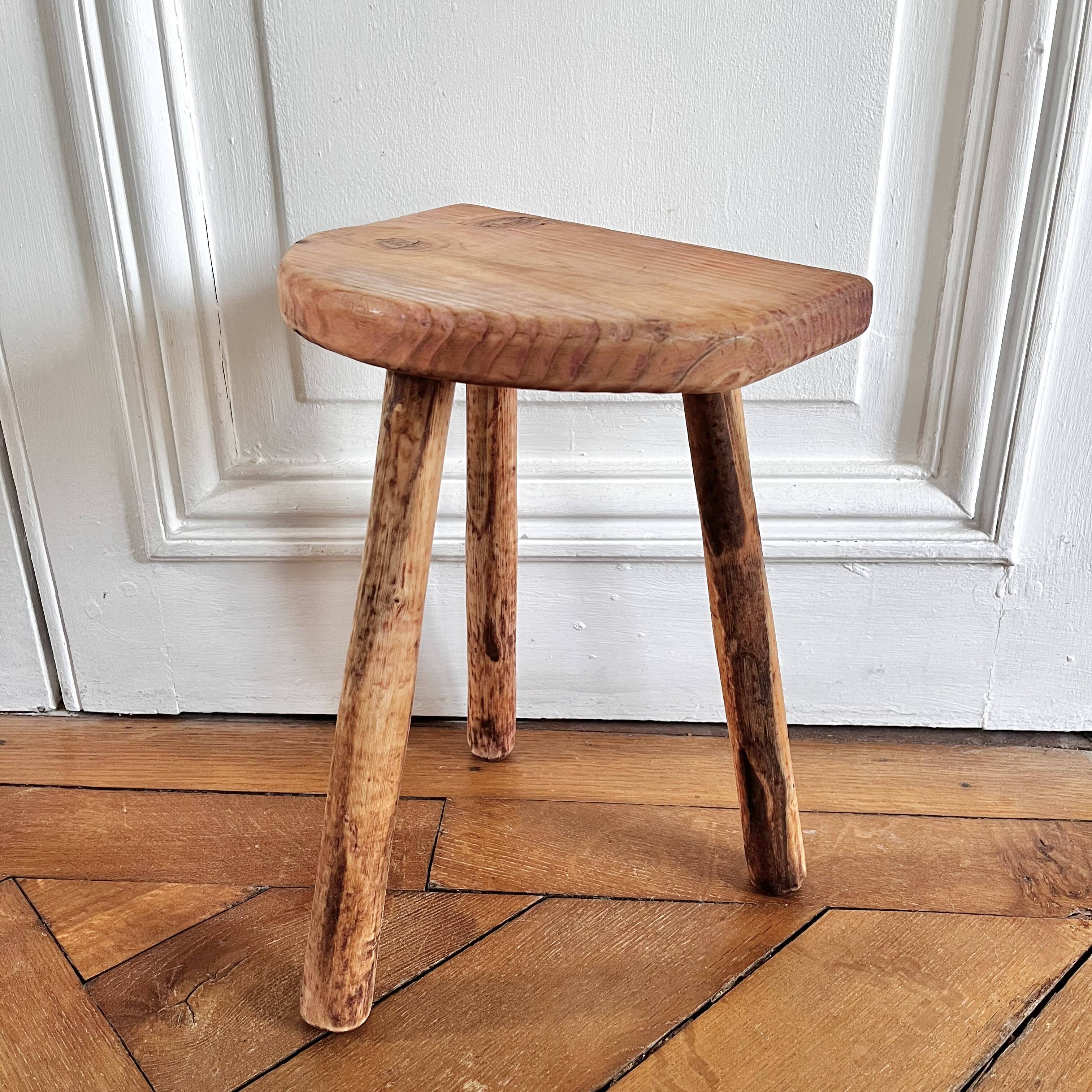 Tripod stool in raw wood