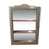 Display shelf with miniature blue wood and mirrors