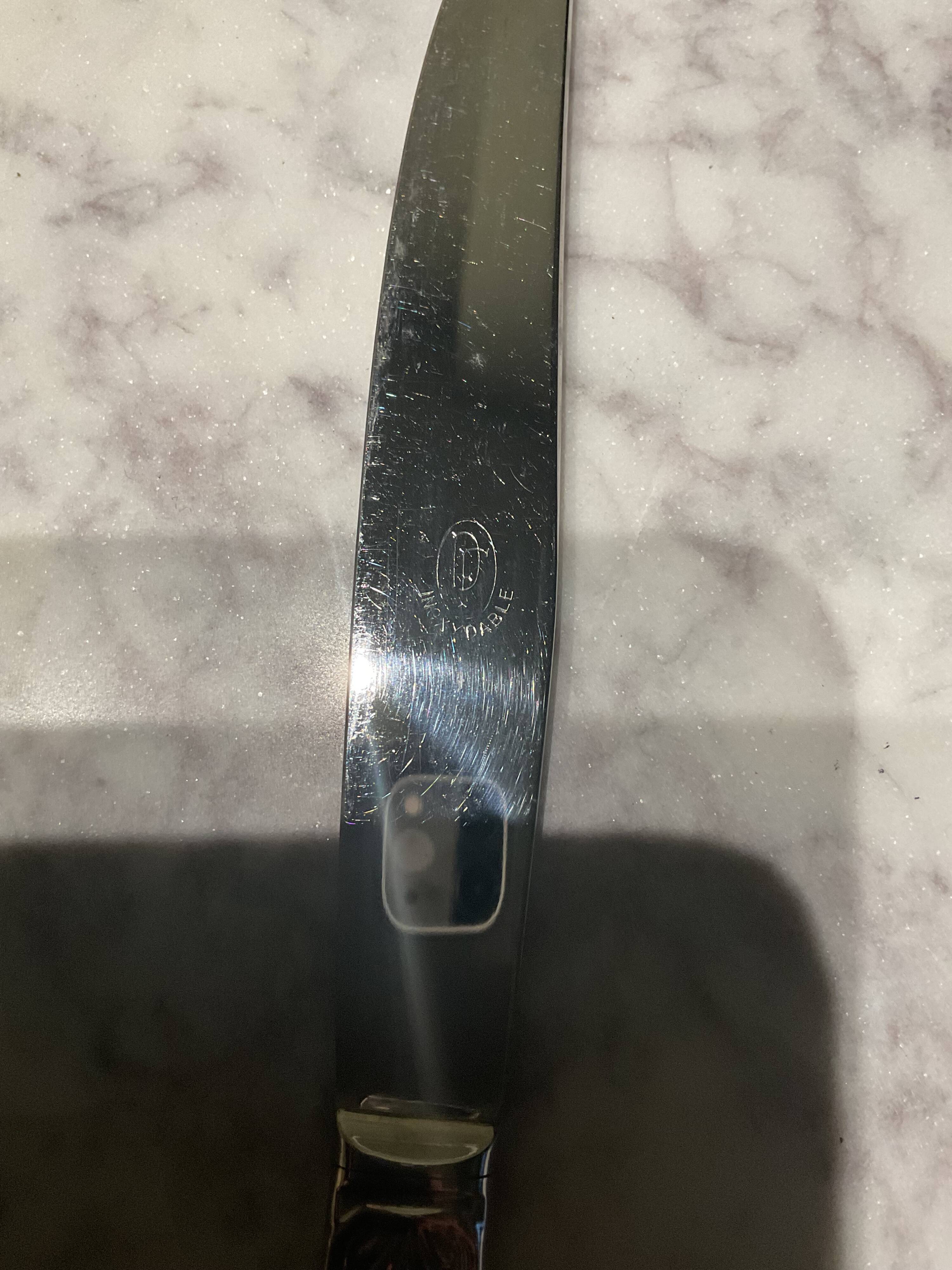 12 couteaux Inox . Vintage