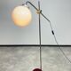 Modern mid-century chrome floor lamps in pairs