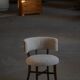 A modern Danish elegant low-back chair, reupholstered in lambswool, 1940s.