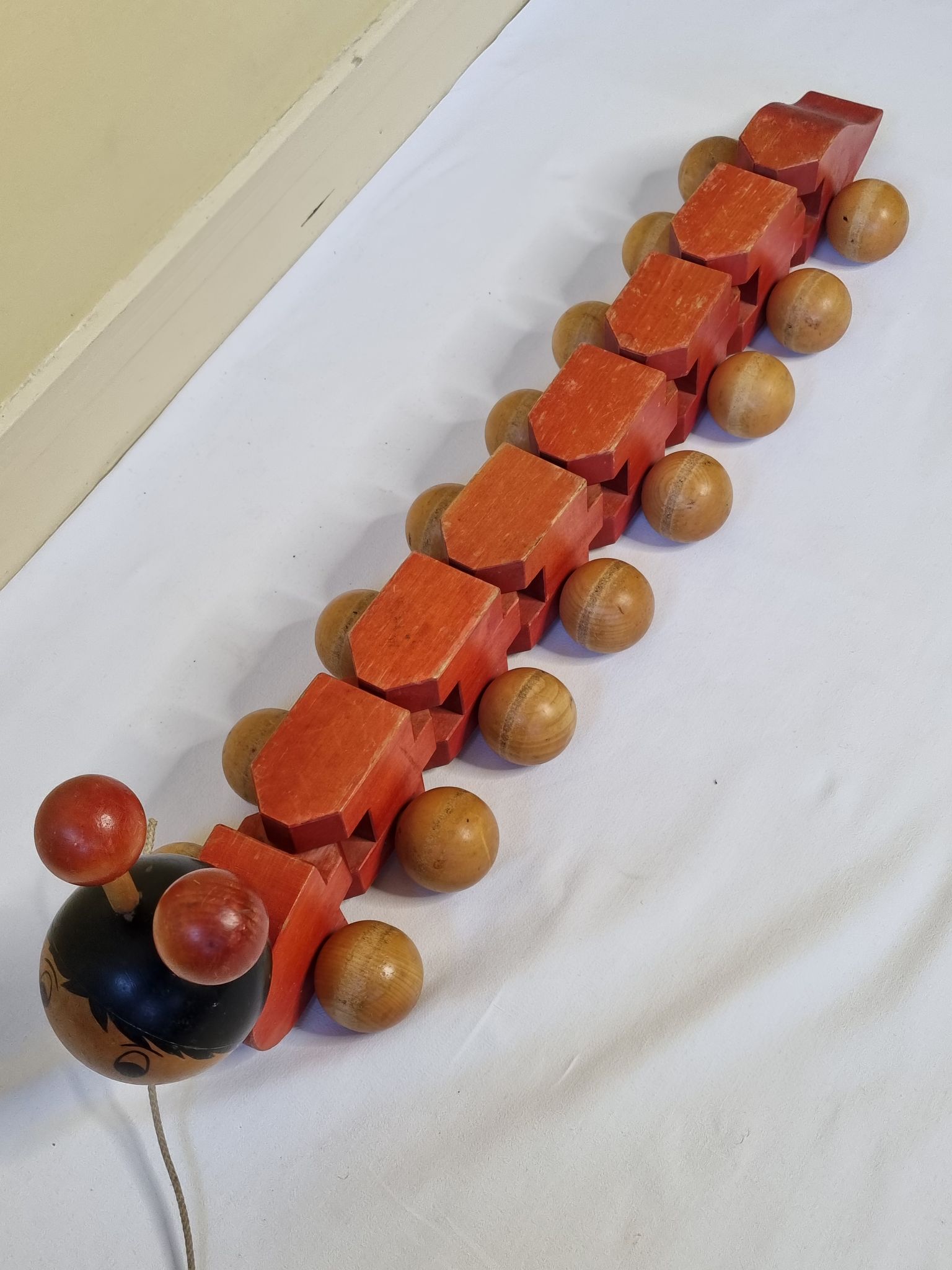 Vintage pulling toy, "centipede", 82 cm, made in Switzerland