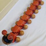 Vintage pulling toy, "centipede", 82 cm, made in Switzerland