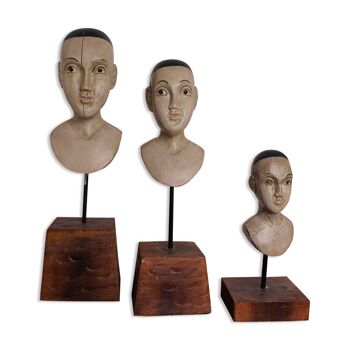 Trio of wooden busts