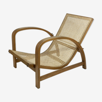 Jindrich Halabala reclining chair in wood and cane, 1930s