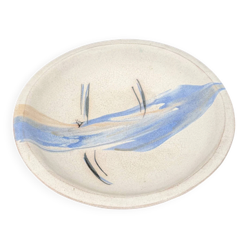Plat en céramique signé