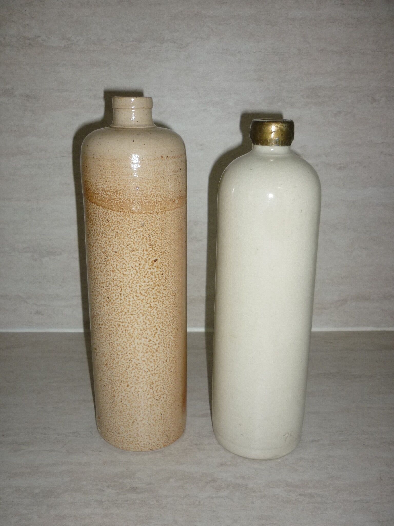 2 bottles of glazed stoneware in natural colours