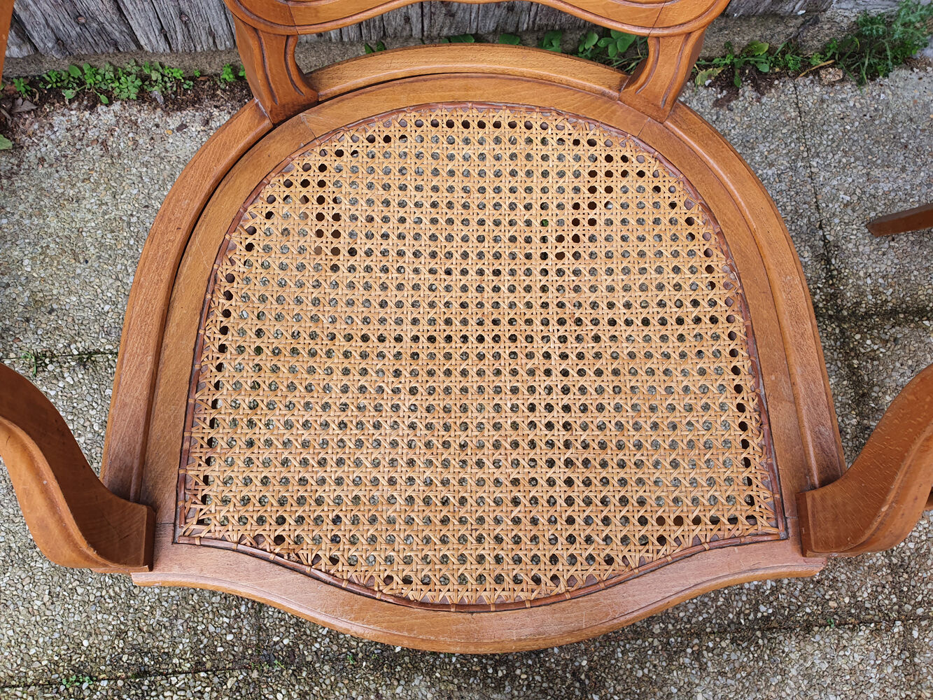 Pair of blond wood cane armchairs from the 60s