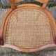 Pair of blond wood cane armchairs from the 60s