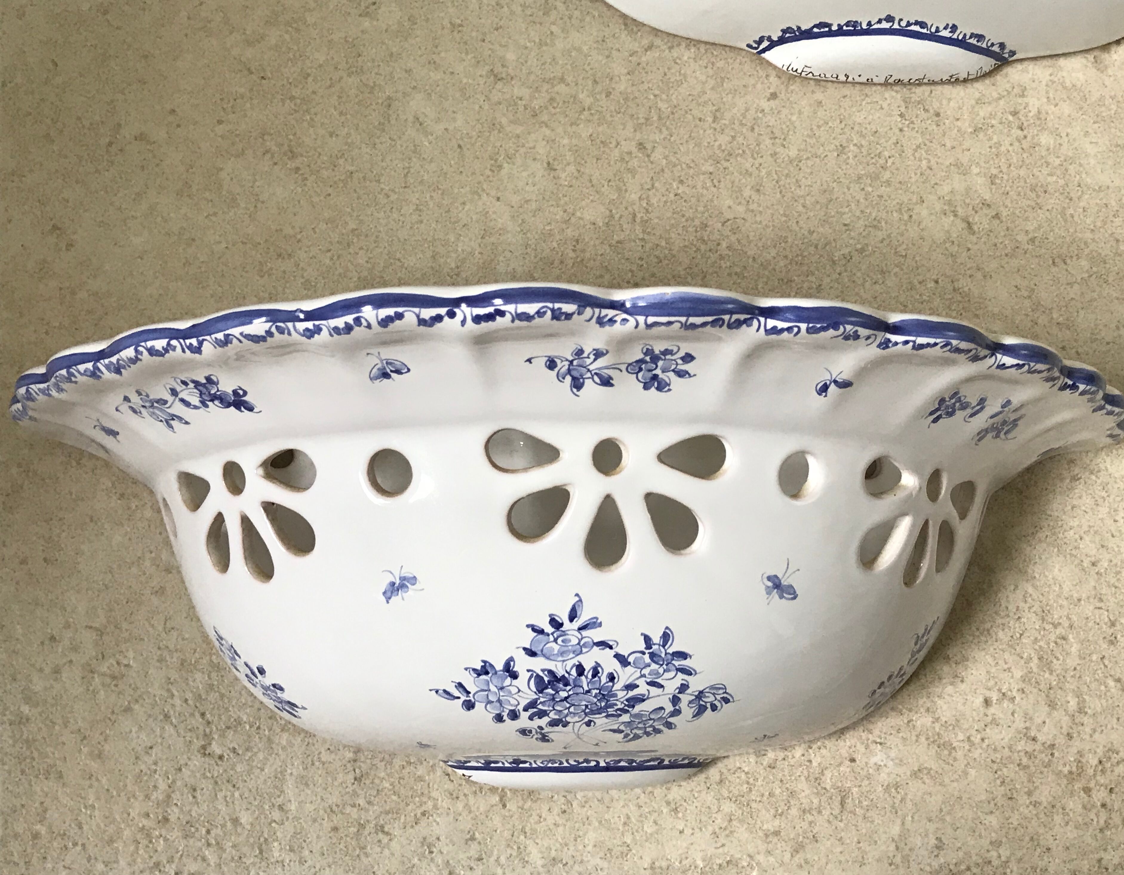 Pair of ceramic moustiers sconces