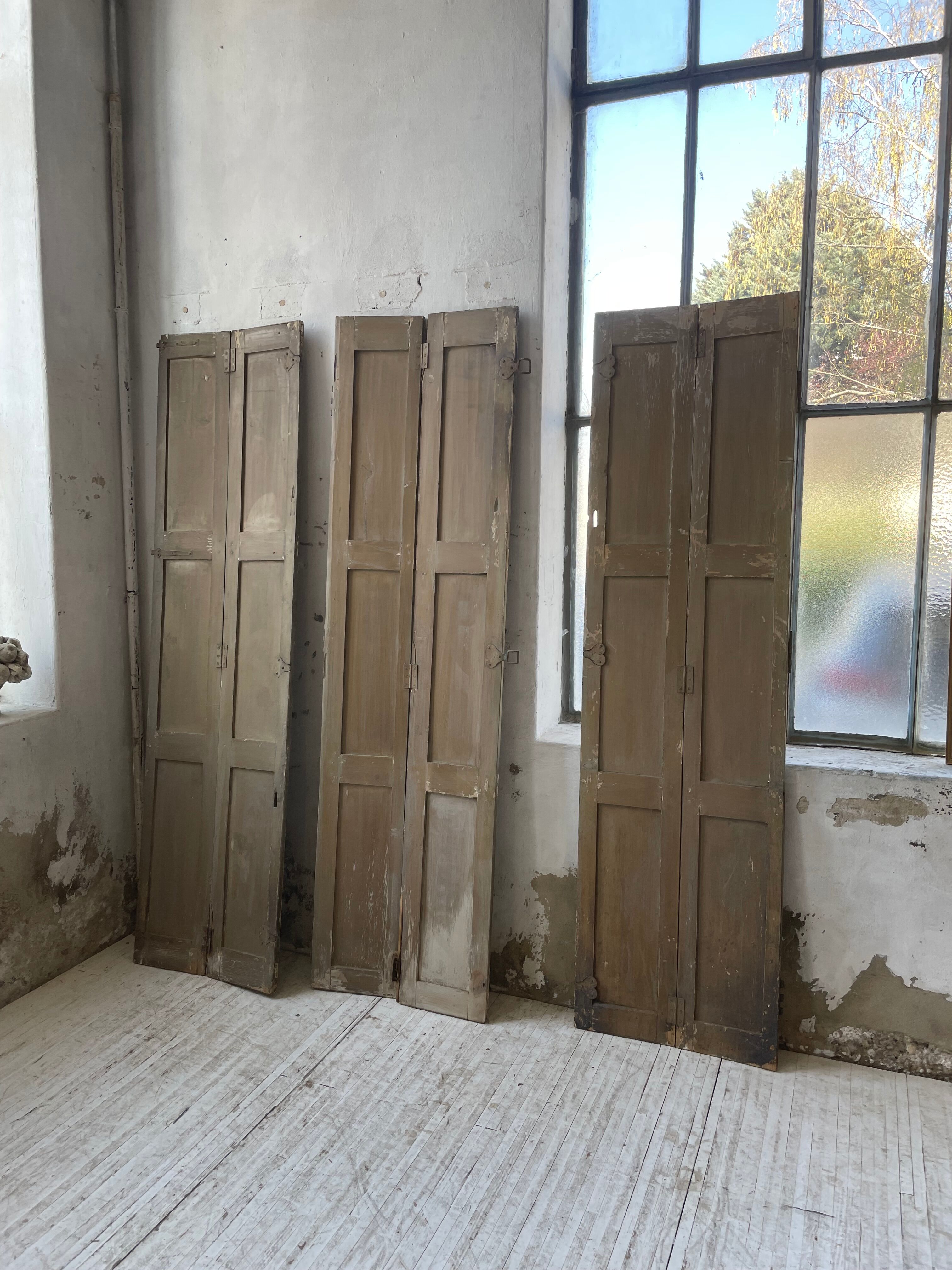 Trio of shutters louvers patina blue gray
