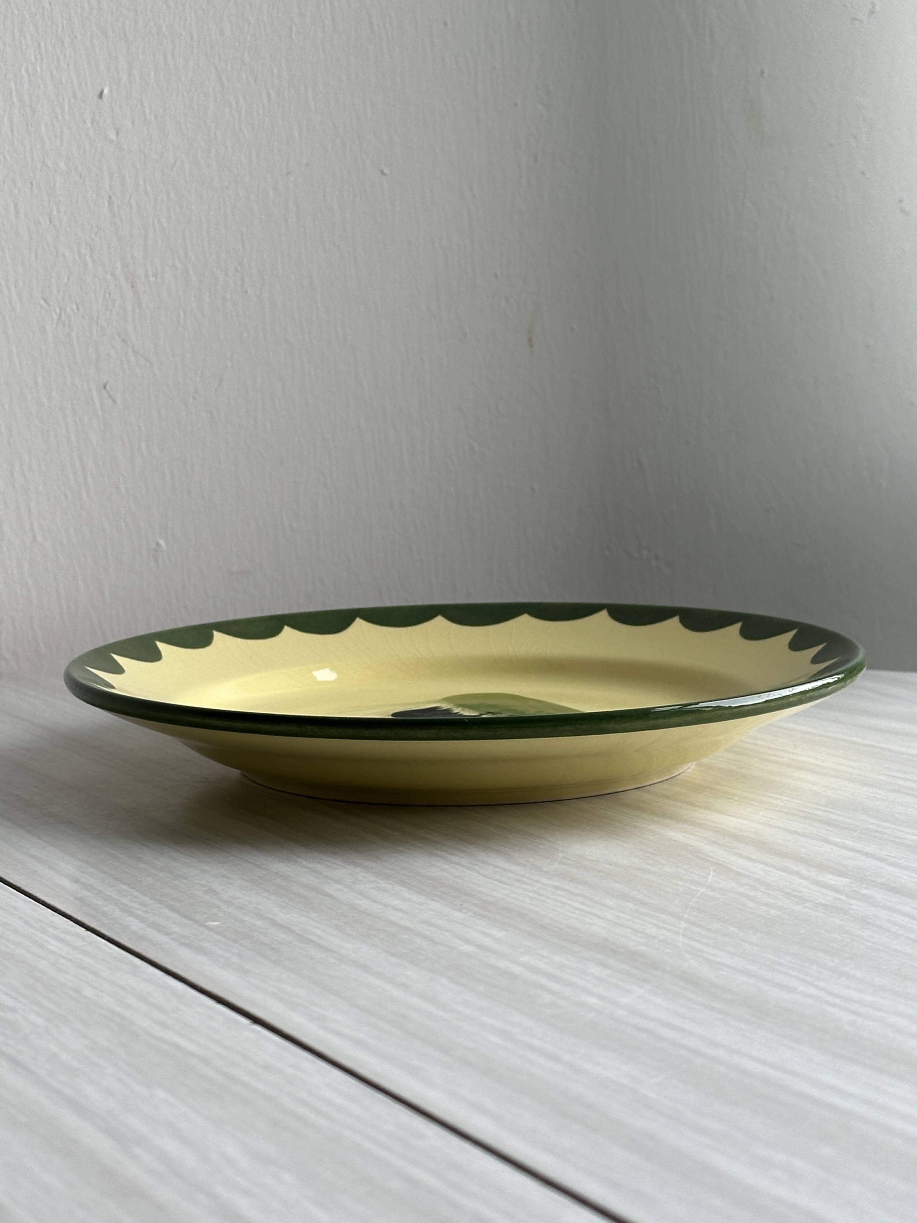 “Teller Keramik” ceramic plate with rooster motif.