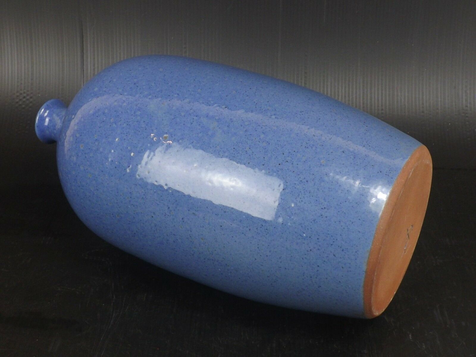Signed enamelled terracotta bottle vase