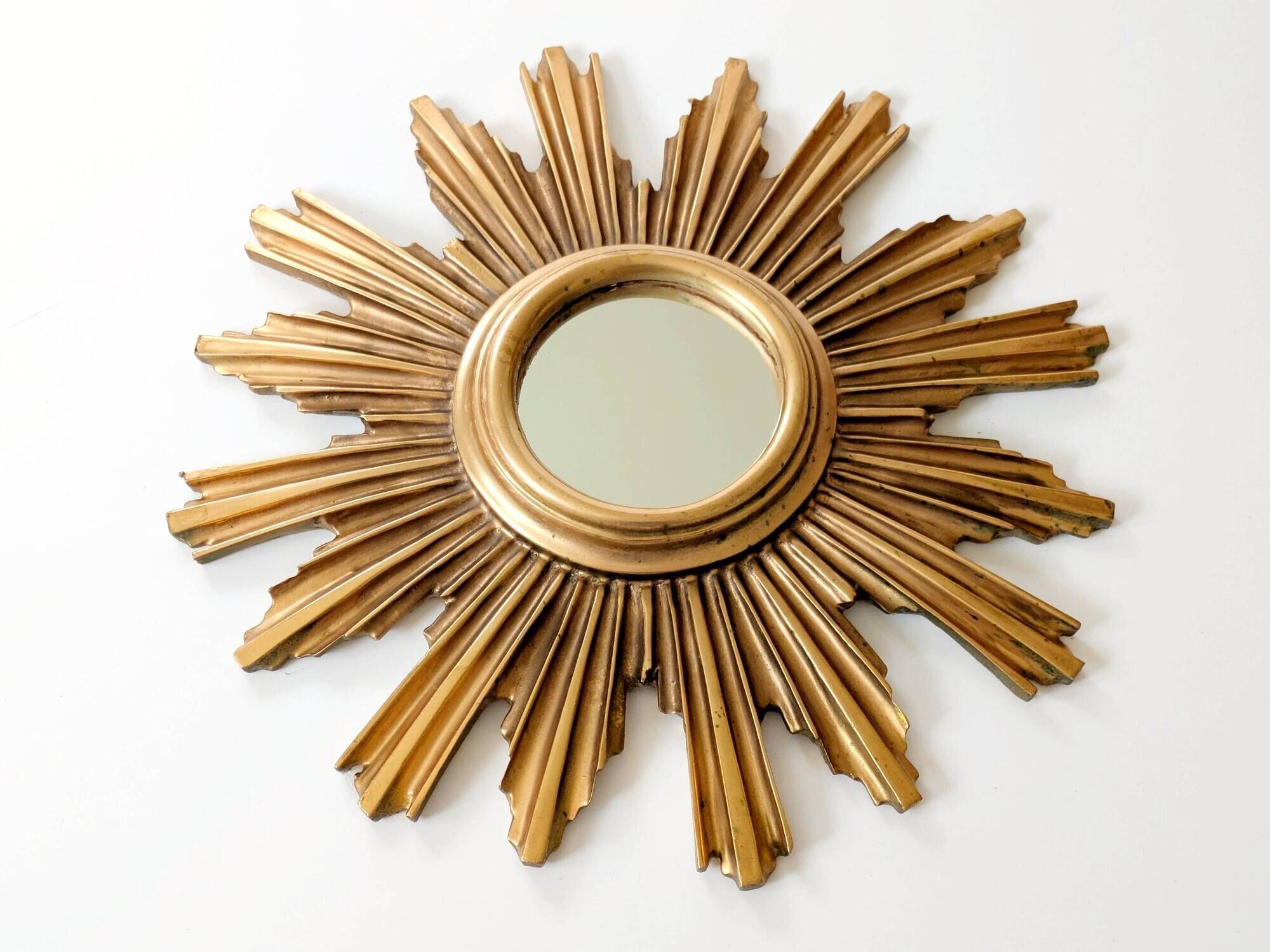 Vintage sunburst mirror in wood and gold resin, 1960s–70s