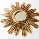 Vintage sunburst mirror in wood and gold resin, 1960s–70s