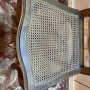 Set of 10 Louis XV style chairs in walnut and cane.