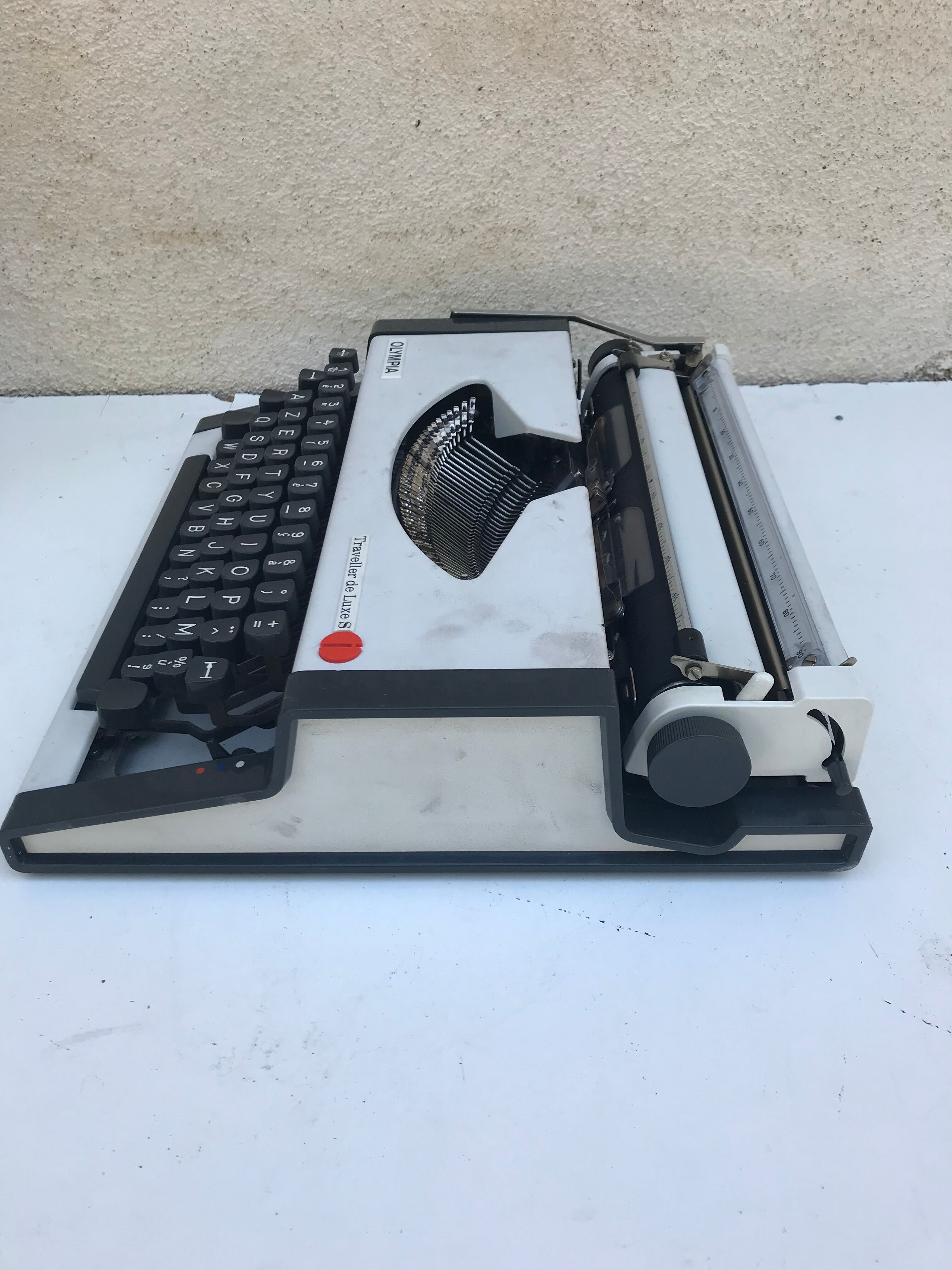 Olympia traveller luxury typewriter with its trunk