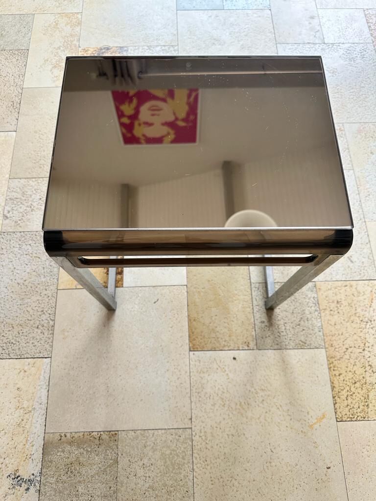 Small chrome-plated metal service