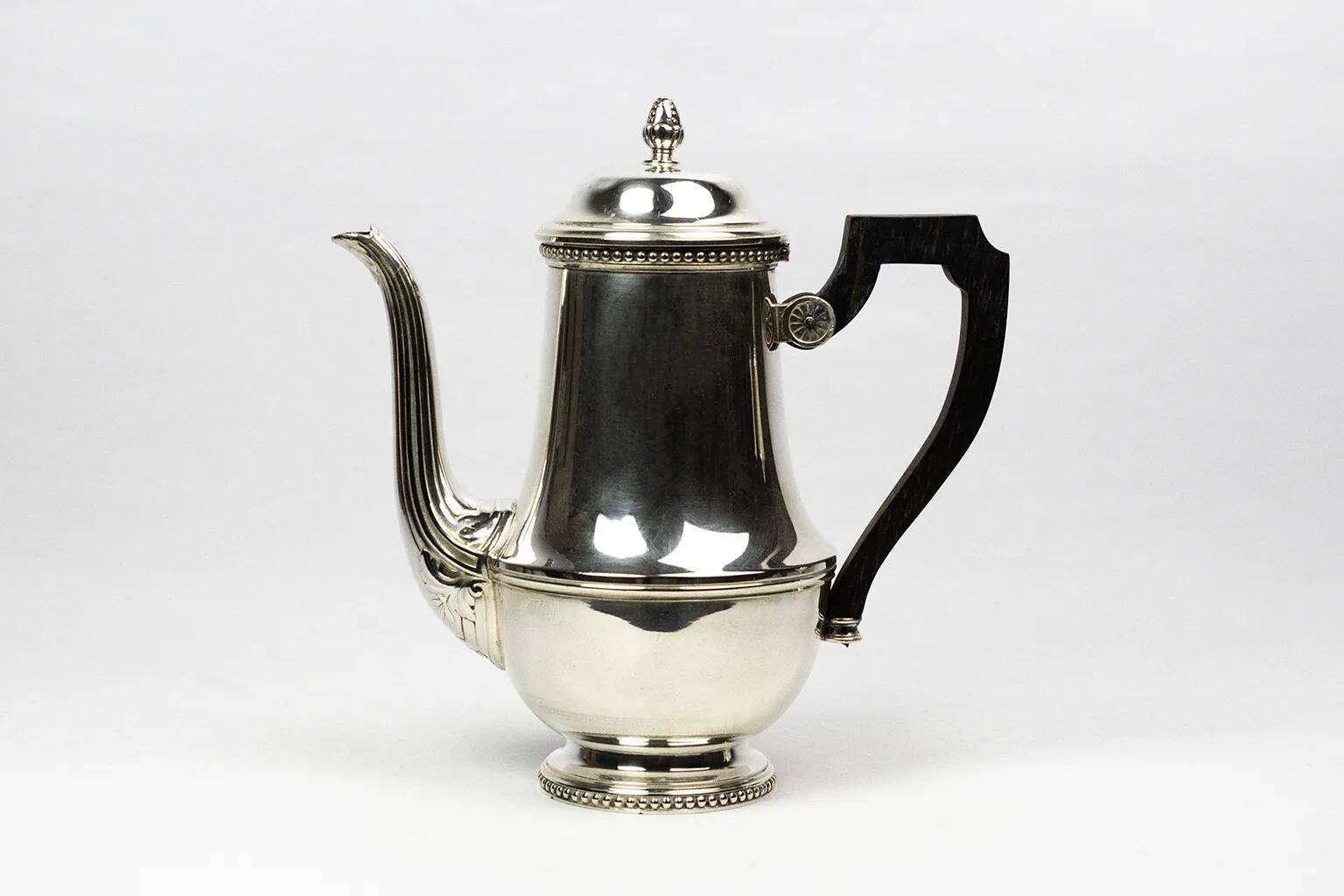 Silver-plated metal coffee pot Ercuis — decorated with bead friezes, ebony handle.