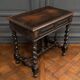 Louis XIII style blackened walnut desk, late 19th century, turned legs, one drawer