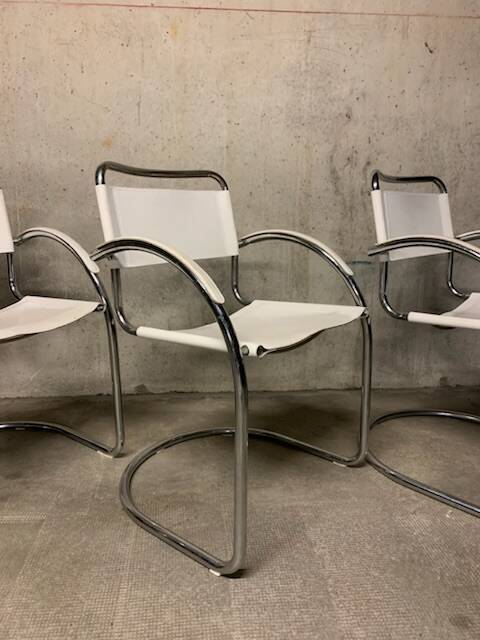 Lot of three vintage tubular armchairs from the 70's
