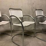 Lot of three vintage tubular armchairs from the 70's