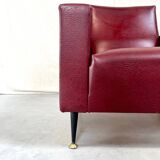 Vintage burgundy armchair, compass base in black metal and brass