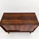 Low sideboard in rosewood with sliding doors. Denmark, 1960s