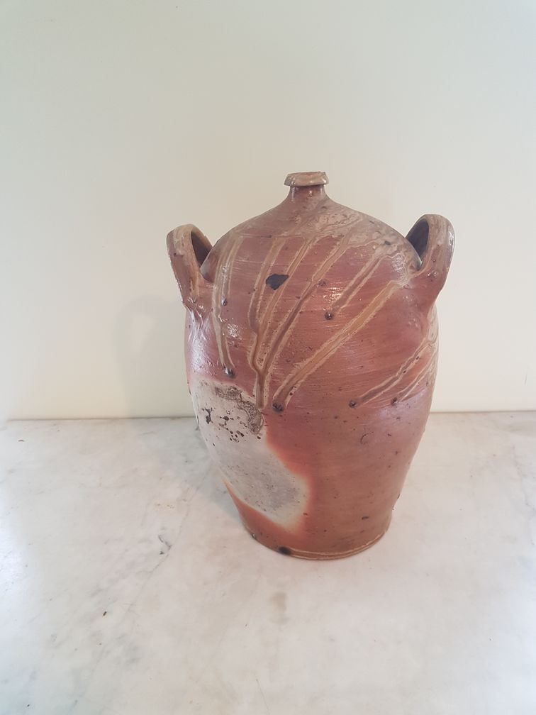 Jar or lady jeanne in varnished sandstone