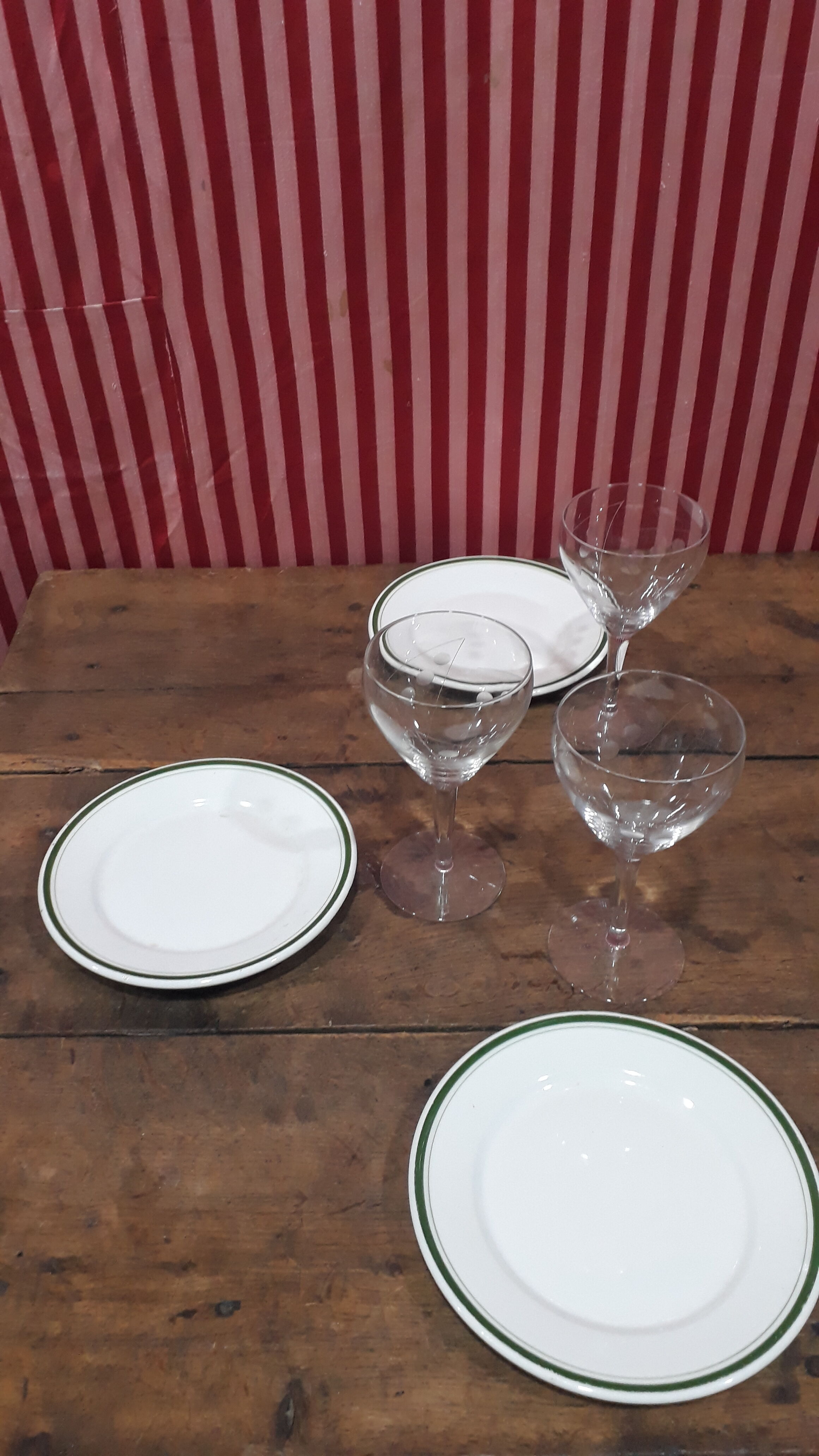 3 plates in white porcelain and green edging