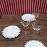 3 plates in white porcelain and green edging