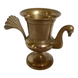 Empty brass bird pocket