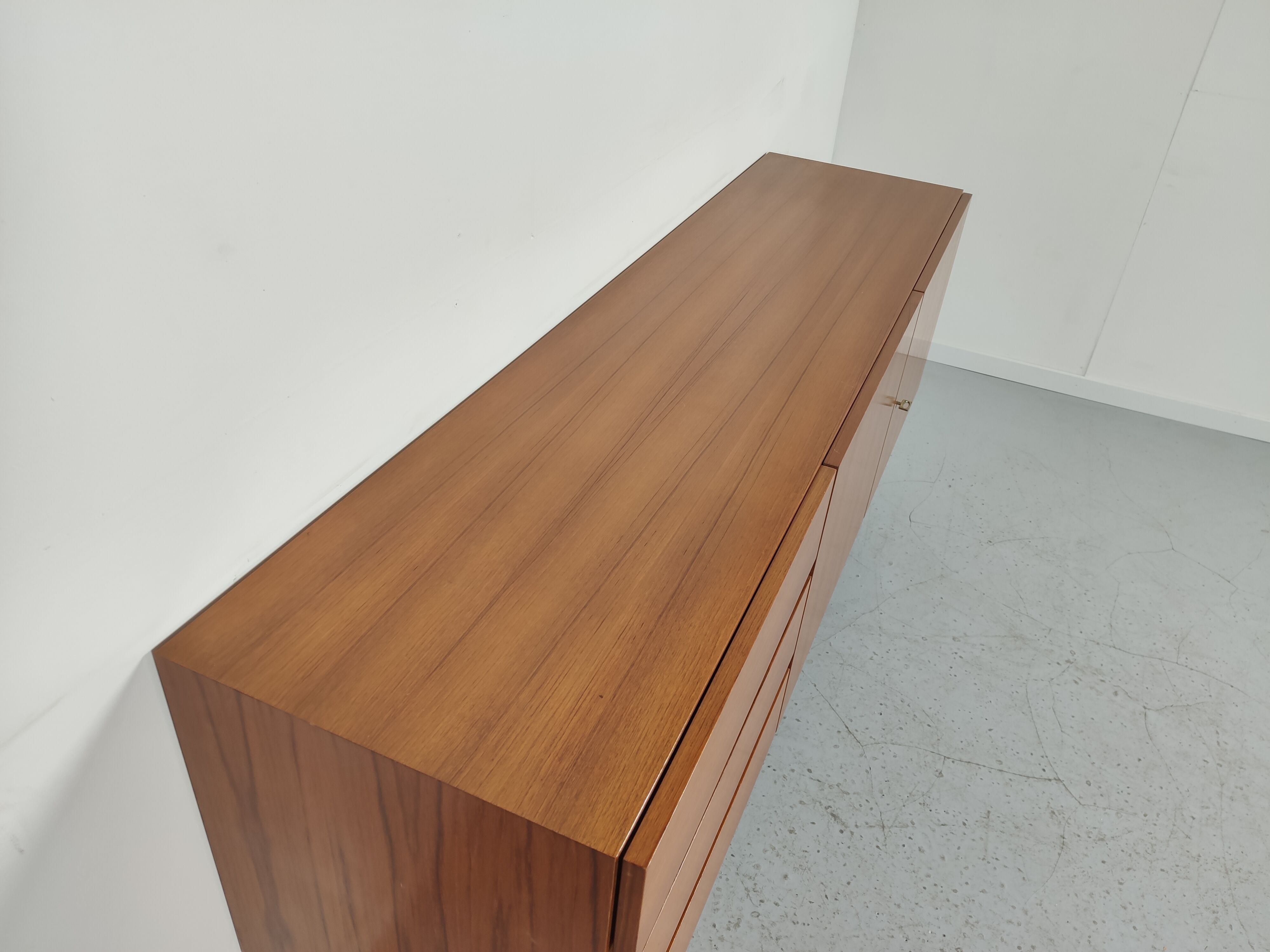 Scandinavian vintage teak and metal long sideboard, 60s