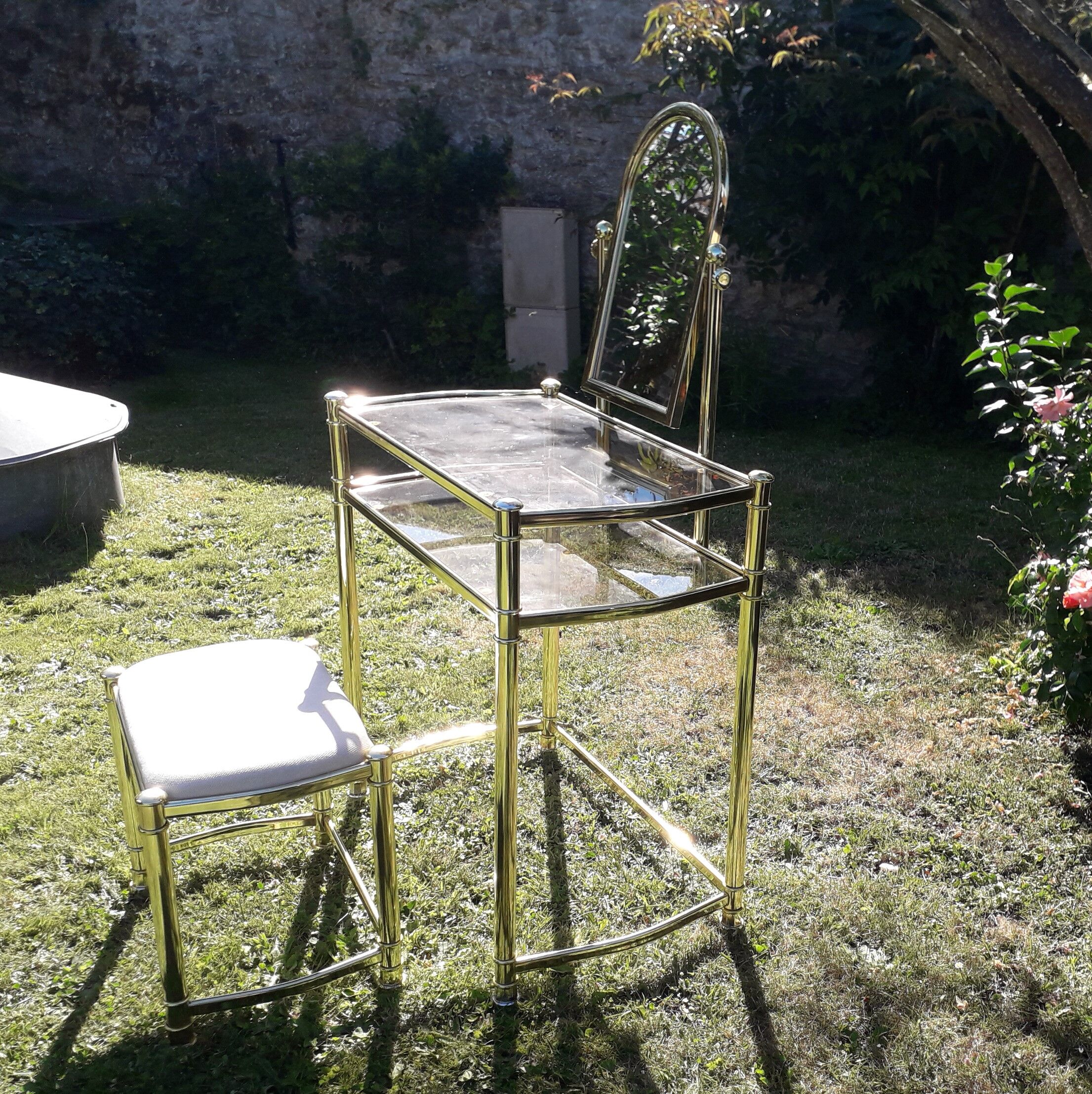 Vintage dressing table and golden metal stool
