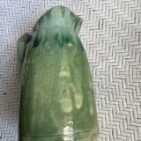 Turquoise green enamelled ceramic pitcher