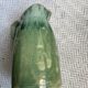 Turquoise green enamelled ceramic pitcher