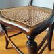 Pair of chairs from the early 20th century, Napoleon III style, with caned seats.