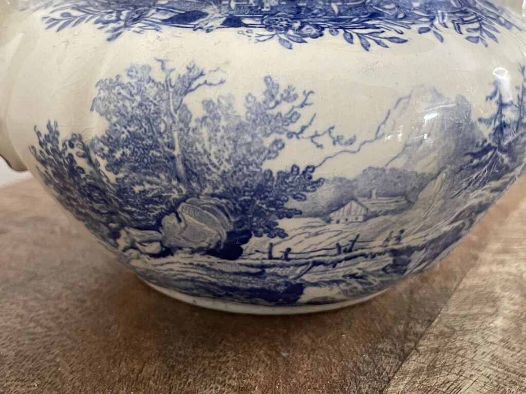 Teapot, milk pot and sugar bowl