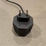 Large modular chrome lamp.