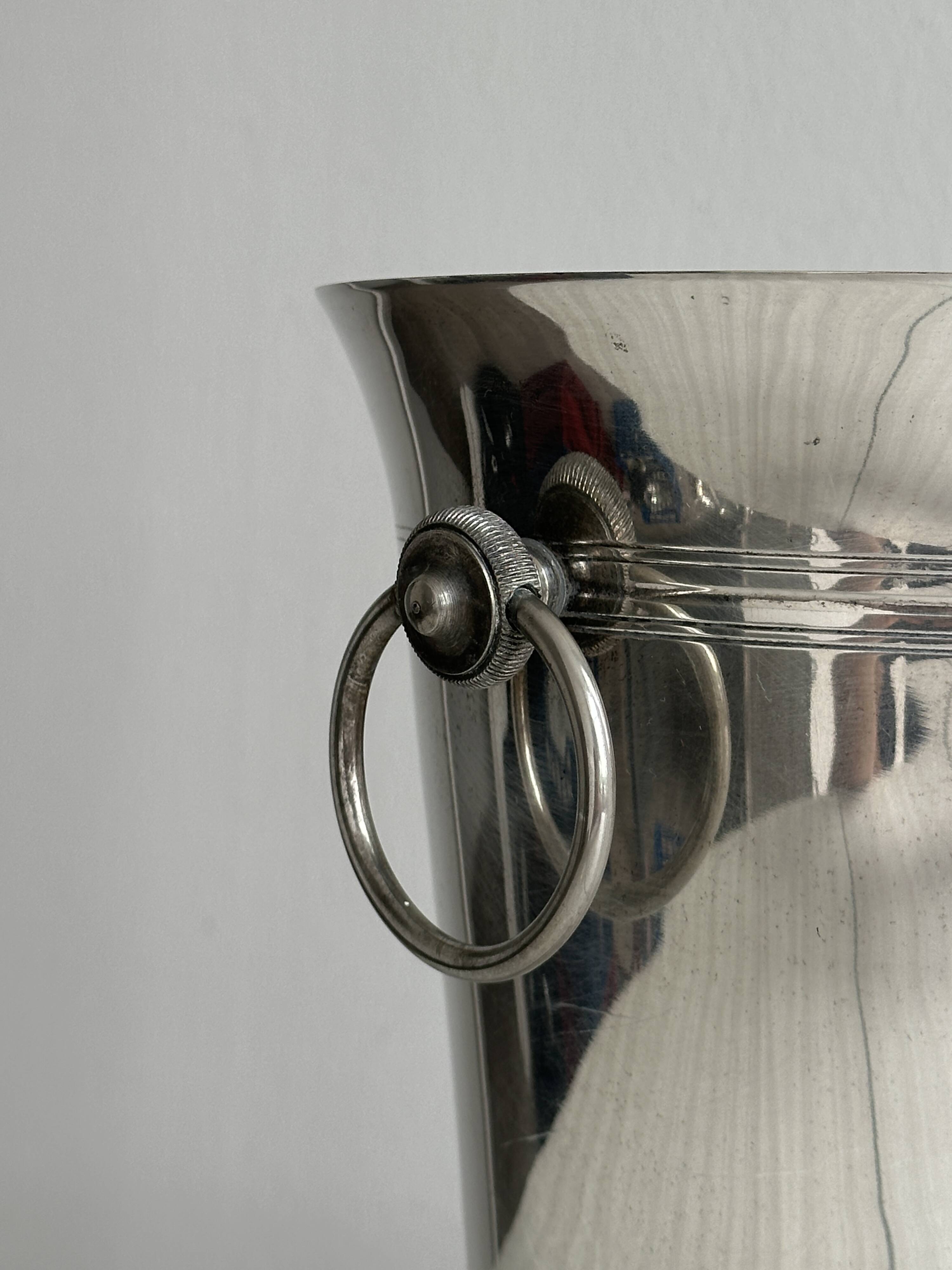 Antique champagne bucket in shiny silver metal