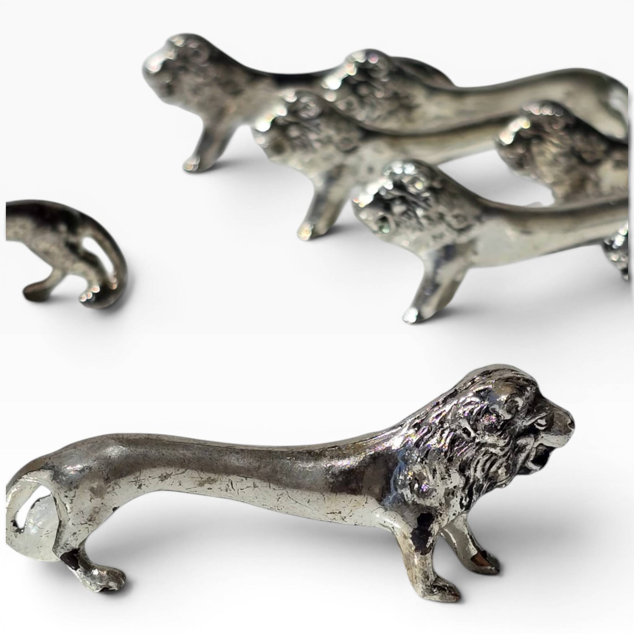 Series of antique knife rests in the shape of a lion, silver-plated metal.